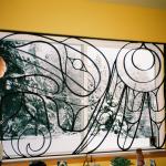 View the image: studio window security art by Leanne and Jorge Vidal